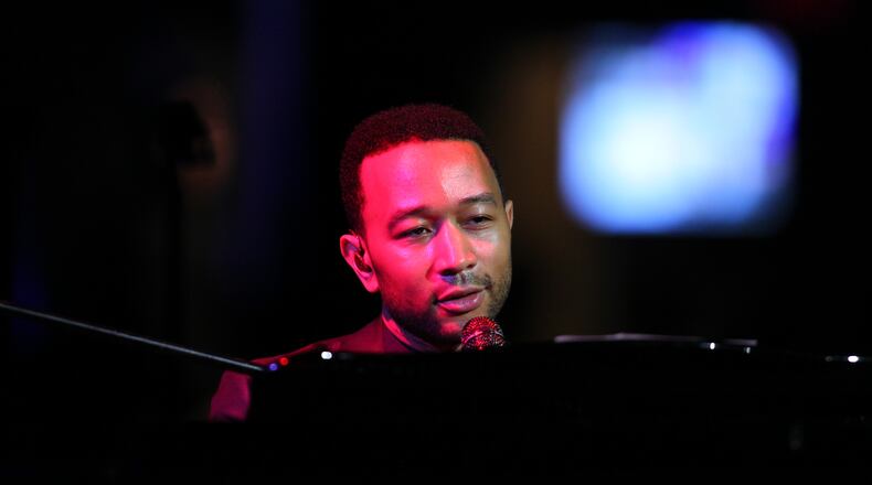 ST PAUL, MN - JULY 20: John Legend performs at the 2014 Starkey Hearing Foundation So The World May Hear Gala at the St. Paul RiverCentre on July 20, 2014 in St. Paul, Minnesota.(Photo by Adam Bettcher/Getty Images for Starkey Hearing Foundation) John Legend's "All of Me" was played nearly 10,000 times in 2014 in Atlanta, more than once an hour. CREDIT: Getty Images