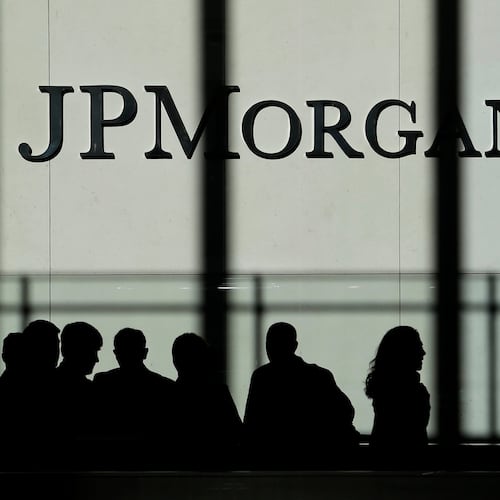 FILE - In this Monday, Oct. 21, 2013, file photo, the JPMorgan Chase & Co. logo is displayed at their headquarters in New York. (AP Photo/Seth Wenig, File)