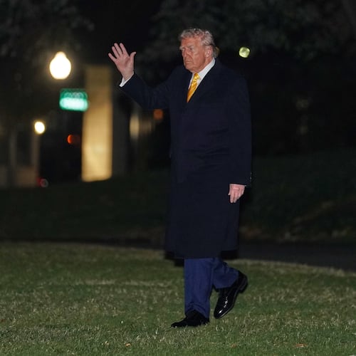 President Donald Trump waves as he walks to board Marine One, Friday, Nov. 14, 2025, on the South Lawn of the White House, in Washington for a trip to Palm Beach, Fla. (AP Photo/Allison Robbert)