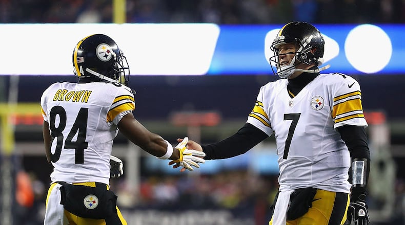 FOXBORO, MA - JANUARY 22: Ben Roethlisberger #7 of the Pittsburgh Steelers celebrates with Antonio Brown #84 after a touchdown by DeAngelo Williams #34 (not pictured) during the second quarter against the New England Patriots in the AFC Championship Game at Gillette Stadium on January 22, 2017 in Foxboro, Massachusetts. (Photo by Al Bello/Getty Images)