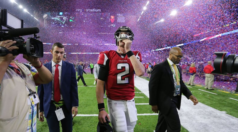 Atlanta Falcons quarterback Matt Ryan leaves the field at the end of the game as the Atlanta Falcons meet the New England Patriots in Super Bowl LI at NRG Stadium in Houston, TX, Sunday, February 5, 2017. The Patriots beat the Falcons in OT 34-28. (Curtis Compton/AJC)