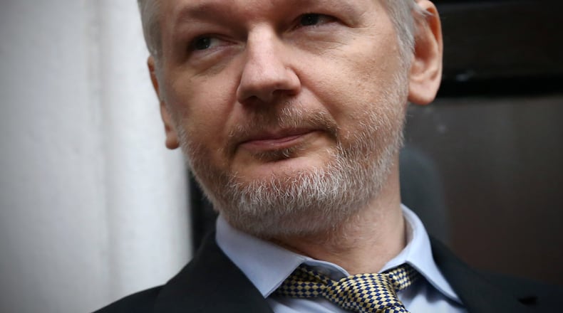 Wikileaks founder Julian Assange speaks from the balcony of the Ecuadorian embassy where he continues to seek asylum following an extradition request from Sweden in 2012, on February 5, 2016 in London, England. The United Nations Working Group on Arbitrary Detention has insisted that Mr Assange's detention should be brought to an end. (Photo by Carl Court/Getty Images)