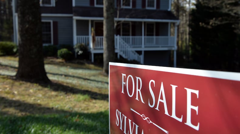 Metro Atlanta home sellers have the market advantage over buyers right now. Sale prices have steadily risen while the number of homes on the market is down. BRANT SANDERLIN / AJC FILE