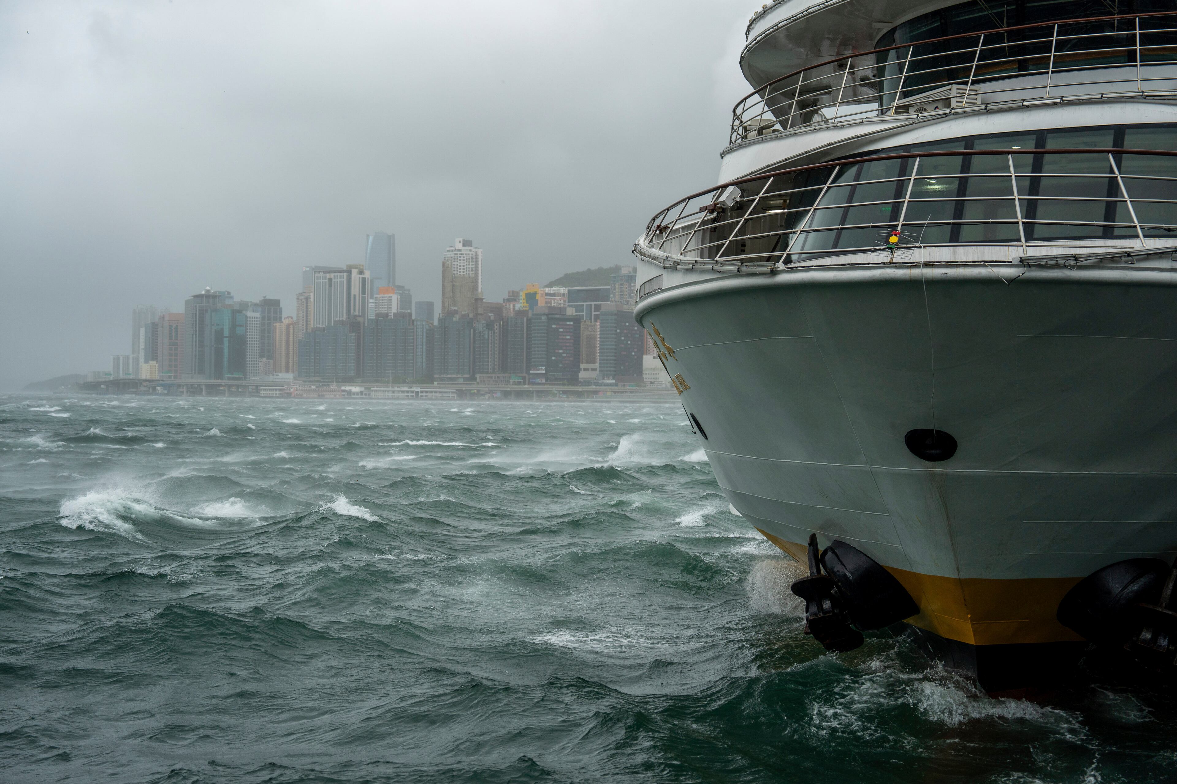 Waves are seen near the Victoria Harbor following the Typhoon Wipha, in Hong Kong, Sunday, July 20, 2025. (AP Photo/Vernon Yuen)