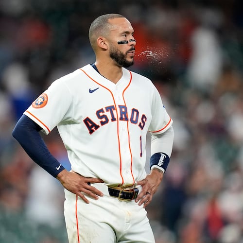 Houston Astros' Carlos Correa (1) reacts after the eighth inning of a baseball game against the New York Yankees, Saturday, April 25, 2026, in Houston. (AP Photo/Karen Warren)
