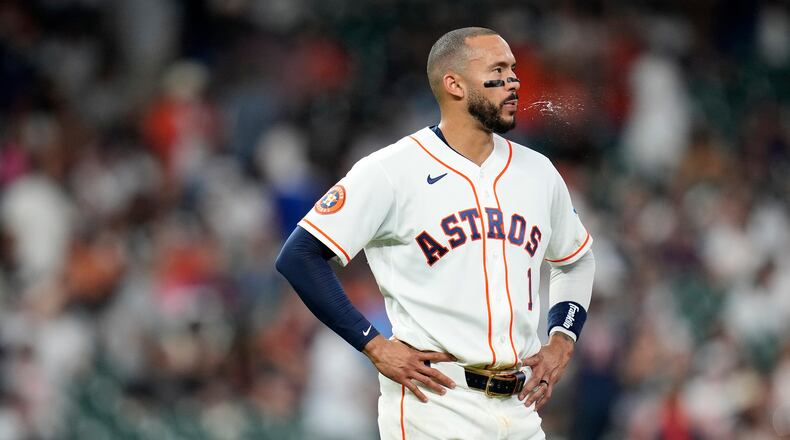 Houston Astros' Carlos Correa (1) reacts after the eighth inning of a baseball game against the New York Yankees, Saturday, April 25, 2026, in Houston. (AP Photo/Karen Warren)