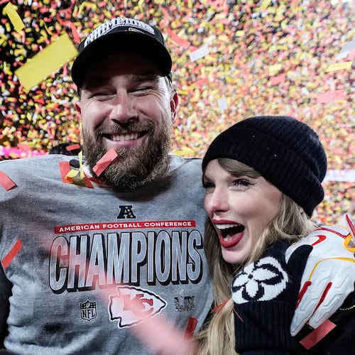 FILE - Travis Kelce, left, and Taylor Swift pose after the AFC Championship NFL football game against the Buffalo Bills, Jan. 26, 2025, in Kansas City, Mo. (AP Photo/Ashley Landis, File)