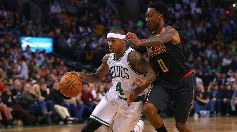Isaiah Thomas (4) of the Boston Celtics drives against Jeff Teague (0) of the Atlanta Hawks during the second quarter at TD Garden on November 13, 2015 in Boston, Massachusetts. (Photo by Maddie Meyer/Getty Images)