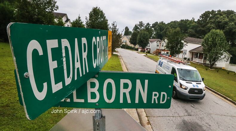 A man walking his dog Wednesday night in DeKalb County shot and killed a teenager who tried to rob him, police said. JOHN SPINK / JSPINK@AJC.COM