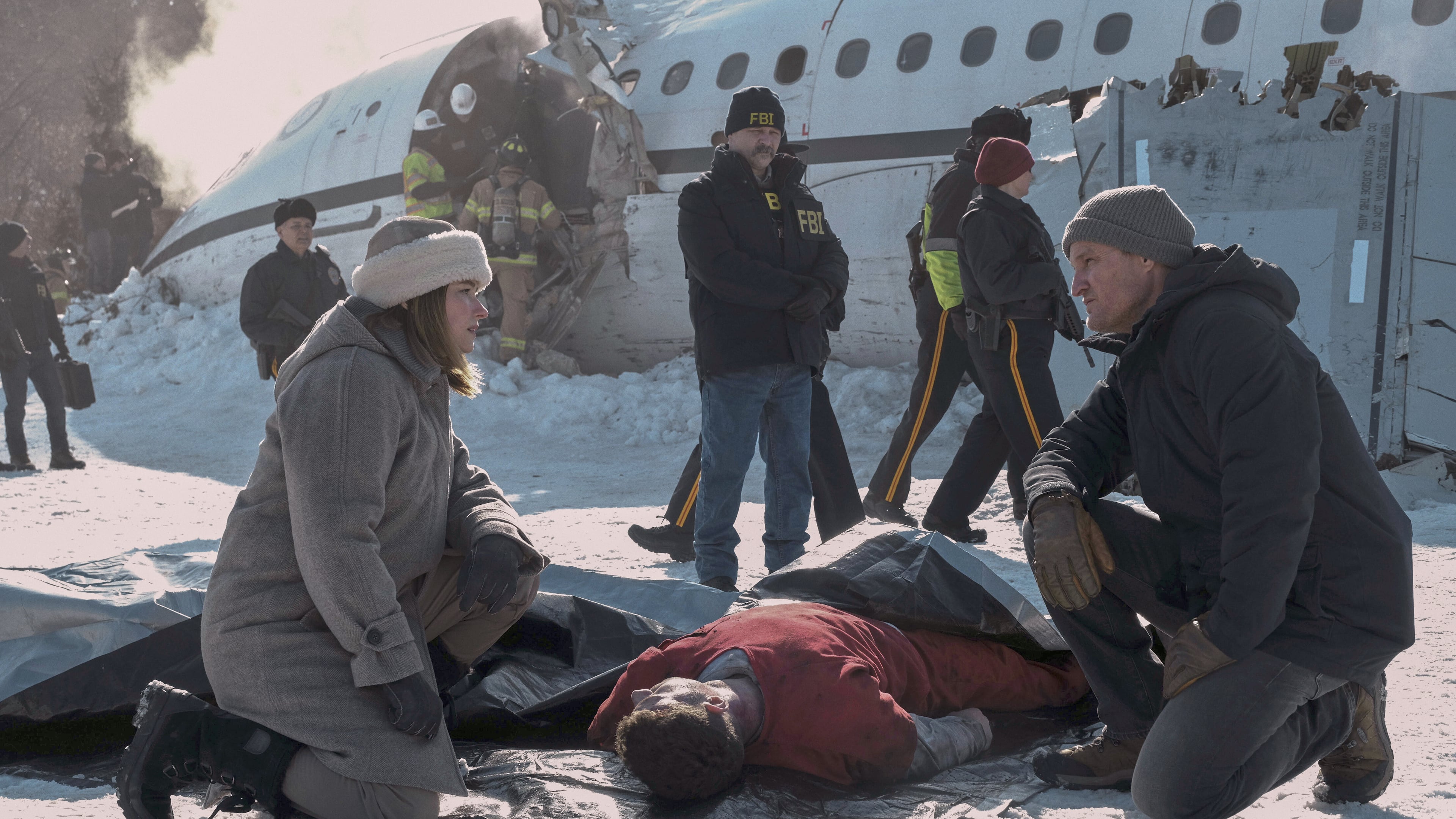 This image released by Apple TV+ shows Haley Bennett, left, and Jason Clarke in a scene from "The Last Frontier." (Apple TV+ via AP)