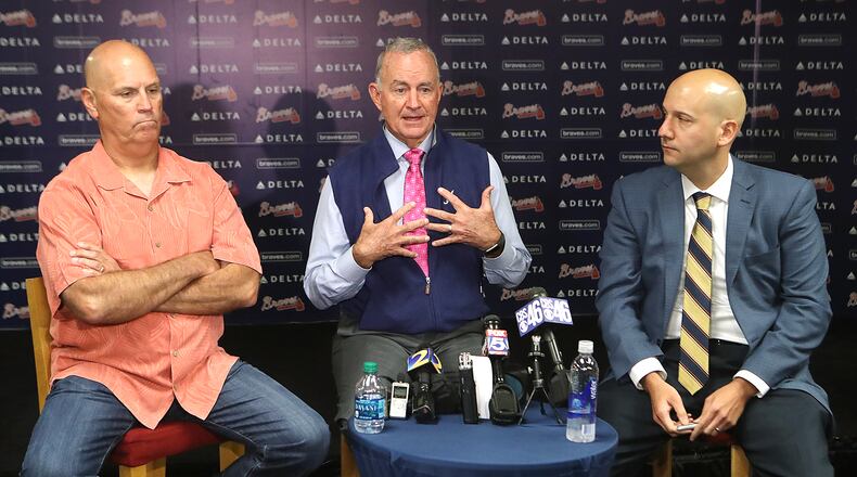 Braves manager Brian Snitker (from left), President of Baseball Operations John Hart and General Manager John Coppolella after the 2016 season. Curtis Compton/ccompton@ajc.com.