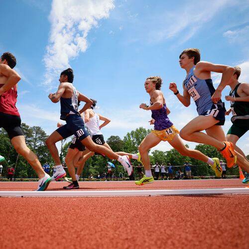 Runners compete in the Class 4A Boys 1,600-Meter Run during the GHSA track and field state championships at UGA’s Spec Towns Track on Monday, May 11, 2026, in Athens. (Miguel Martinez/AJC)