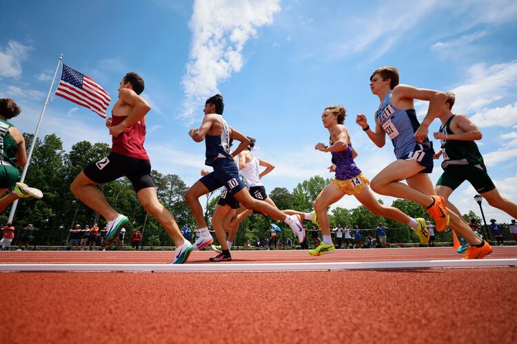 Runners compete in the Class 4A Boys 1,600-Meter Run during the GHSA track and field state championships at UGA’s Spec Towns Track on Monday, May 11, 2026, in Athens. (Miguel Martinez/AJC)