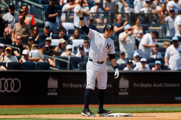 New York Yankees' Ben Rice (22) reacts after hitting an RBI triple during the fifth inning of a baseball game against the Baltimore Orioles, Saturday, June 21, 2025, in New York. (AP Photo/Noah K. Murray)