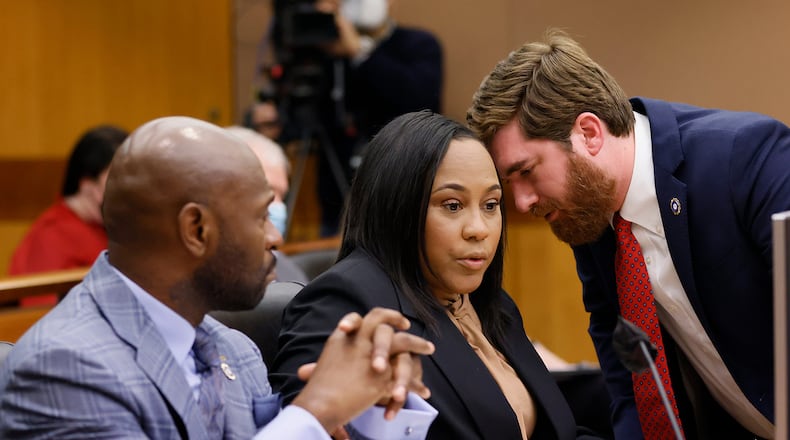 Fulton County D.A. Fani Willis (center) confers with colleagues Nathan Wade (left) and Donald Wakeford (right) during a Jan. 24, 2023, hearing before Fulton Superior Court Judge Robert McBurney. (Miguel Martinez/Atlanta Journal-Constitution/TNS)