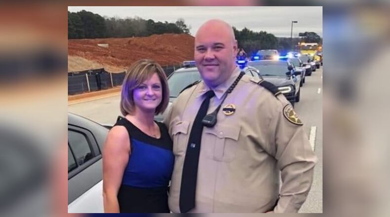 Butts County sheriff's Sgt. Trent Anderson and his wife Jennifer.