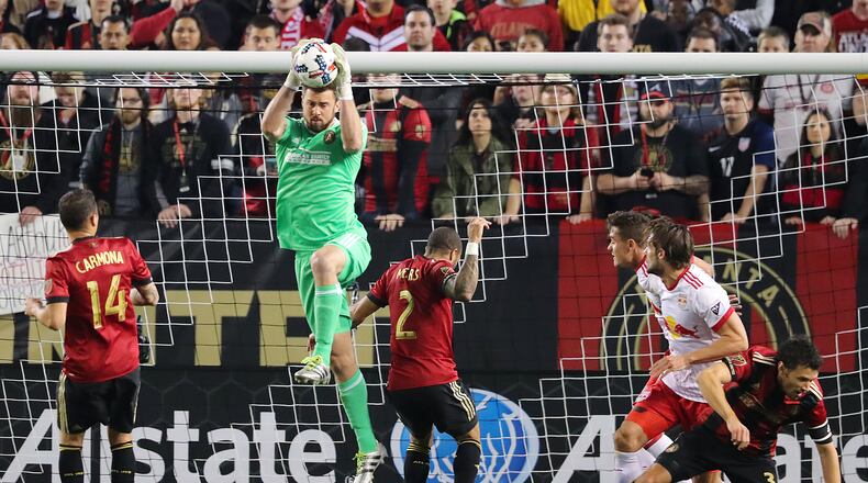 Atlanta United RC goalkeeper Alec Kann saves a shot against the N.Y. Red Bulls during their first game in franchise history on Sunday, March 5, 2017, in Atlanta. (Curtis Compton/ccompton@ajc.com)