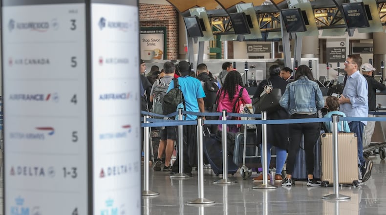 The Delta Air Lines ticket counter at the International Terminal at Hartsfield-Jackson International Airport on Thursday.JOHN SPINK/JSPINK@AJC.COM