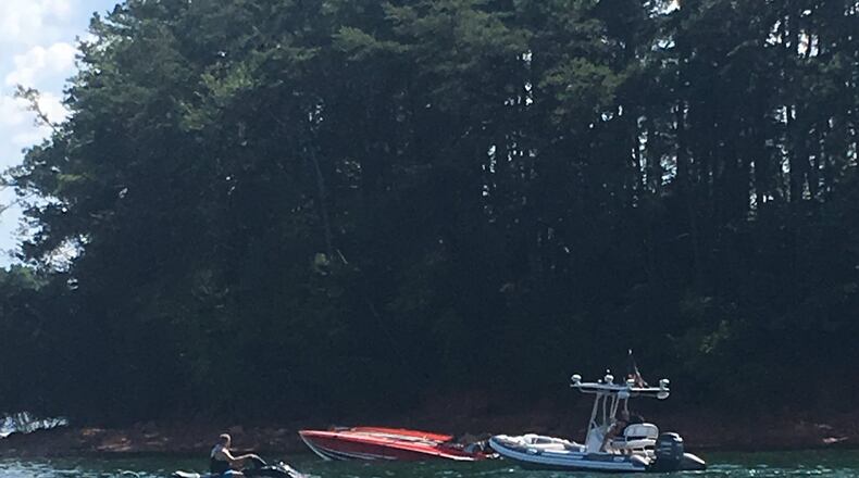 Officials are searching Lake Lanier after a boat overturned Friday. (Credit: Channel 2 Action News)