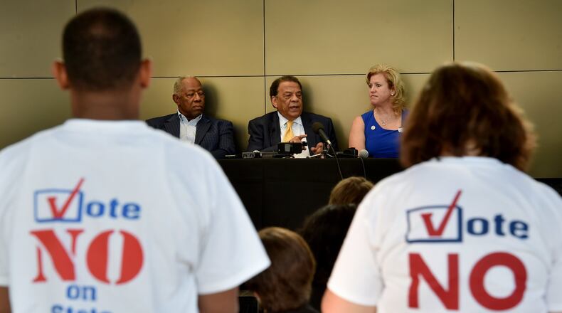 October 18, 2016 Atlanta: Civil Rights icon and former mayor Andrew Young, center, held a press conference with MLB legend Hank Aaron, and Georgia PTA President Lisa-Marie Haygood to encourage a “no” vote on the constitutional amendment to let the state take control of failing schools. The amendment failed in November. BRANT SANDERLIN/BSANDERLIN@AJC.COM