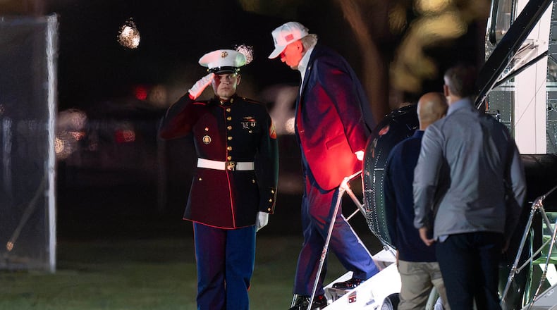 President Donald Trump steps off from Marine One upon his arrival at the Ellipse just outside of the White House, Saturday, Sept. 19, 2026, in Washington. (AP Photo/Jose Luis Magana)