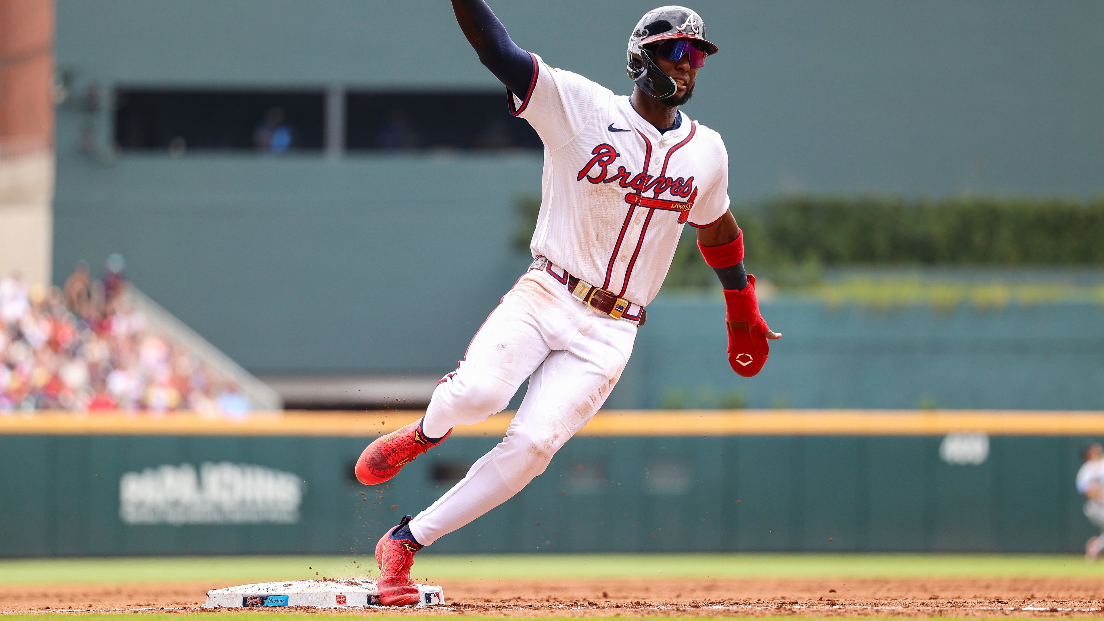 Atlanta Braves' Jurickson Profar rounds third base in the third inning of a baseball game against the Miami Marlins, Saturday, Aug. 9, 2025, in Atlanta. (AP Photo/Colin Hubbard)