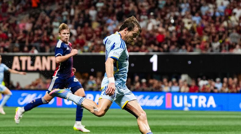 Atlanta United forward Saba Lobjanidze #9 passes the ball during the match against the FC Dallas at Mercedes-Benz Stadium in Atlanta, GA on Saturday April 5, 2025. (Photo by Mitch Martin/Atlanta United)