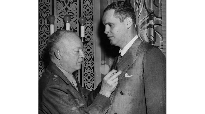 Gen. Dwight D. Eisenhower presenting the Medal of Freedom to Wright Bryan, on Nov. 20, 1947, Editor of the Atlanta Journal, for services as a war correspondent in European Theatre, 1943-45. (File photo)