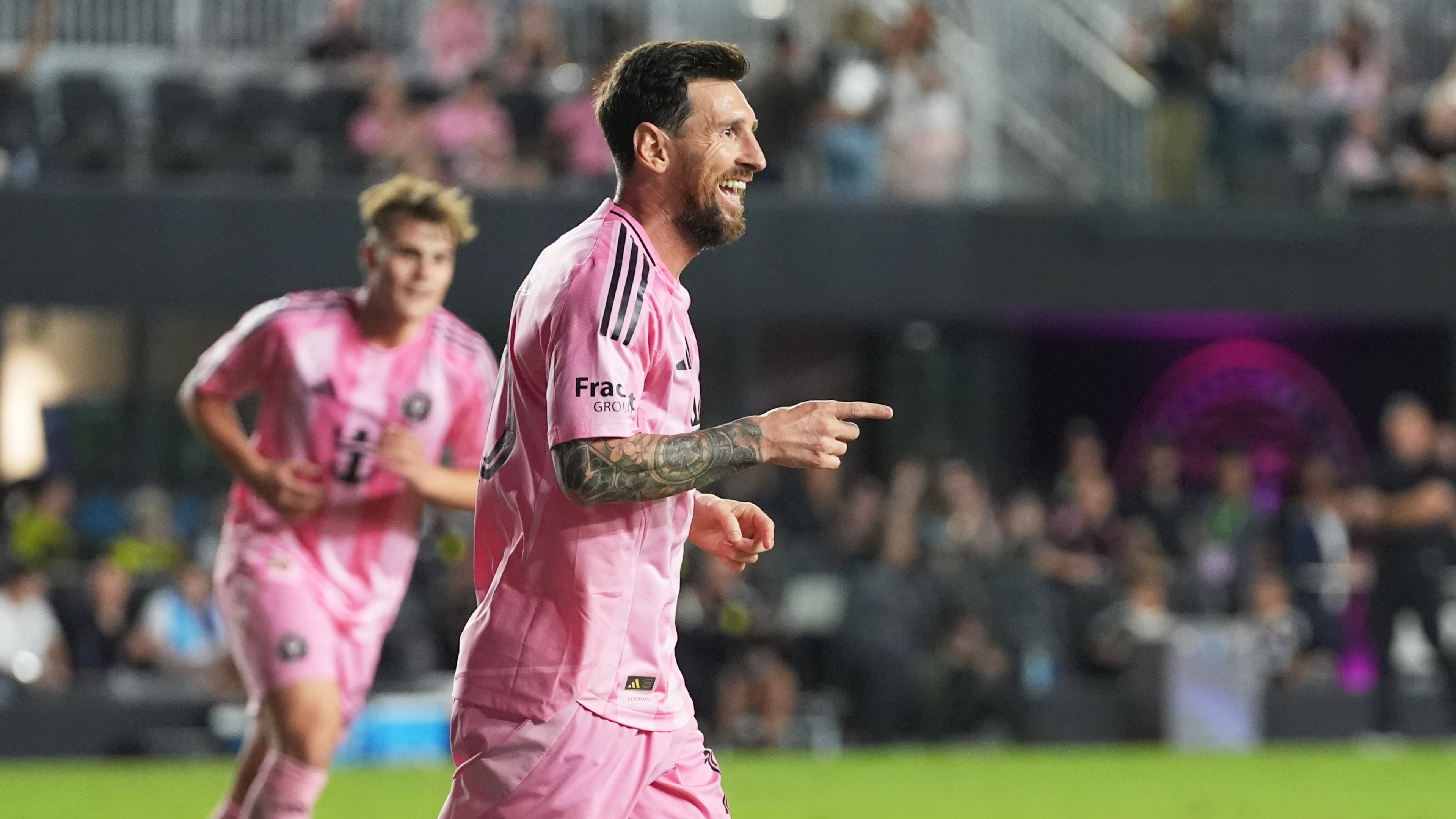 Inter Miami forward Lionel Messi (10) reacts after scoring a goal during the second half of match one of an MLS playoff opening round soccer match against the Nashville SC, Friday, Oct. 24, 2025, in Fort Lauderdale, Fla. (AP Photo/Marta Lavandier)