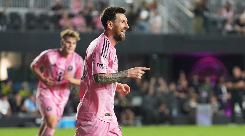 Inter Miami forward Lionel Messi (10) reacts after scoring a goal during the second half of match one of an MLS playoff opening round soccer match against the Nashville SC, Friday, Oct. 24, 2025, in Fort Lauderdale, Fla. (AP Photo/Marta Lavandier)
