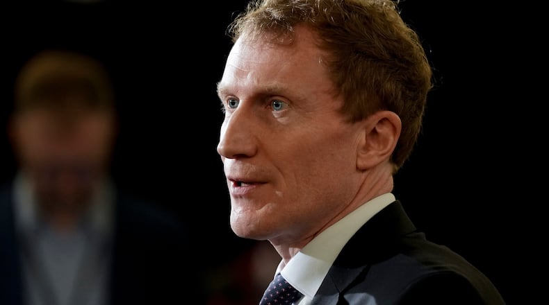 FILE - Canada's Minister of Immigration, Refugees and Citizenship Marc Miller speaks to the media during the federal cabinet retreat in Montreal, Monday, Jan. 22, 2024. (Christinne Muschi/The Canadian Press via AP,File)