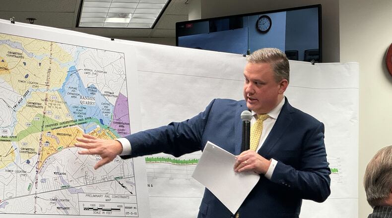 Greg Teague, the CEO of Croy Engineering, points to a map of the proposed Hanson Spur that the Sandersville Railroad Company is seeking to build, at a hearing at the Georgia Public Service Commission. (Drew Kann/The Atlanta Journal-Constitution/TNS)