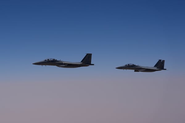 Saudi Air Force F-15 warplanes escort Air Force One carrying President Donald Trump as it arrives in Saudi Arabia, Tuesday, May 13, 2025. (AP Photo/Alex Brandon)
