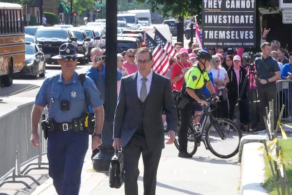 Prosecutor Hank Brennan arrives at Norfolk Superior Court during the Karen Read trial, Monday, June 16, 2025, in Dedham, Mass. (AP Photo/Charles Krupa)