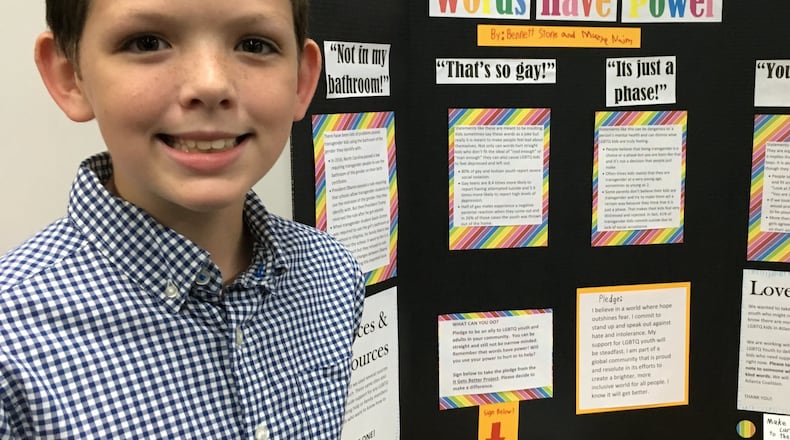 Bennett Stone with his “Love Notes” display at his school in Roswell. Bennett’s idea to write notes of encouragement to transgender students inspired the nonprofit Georgia Equality to launch a campaign encouraging others to write notes. CONTRIBUTED