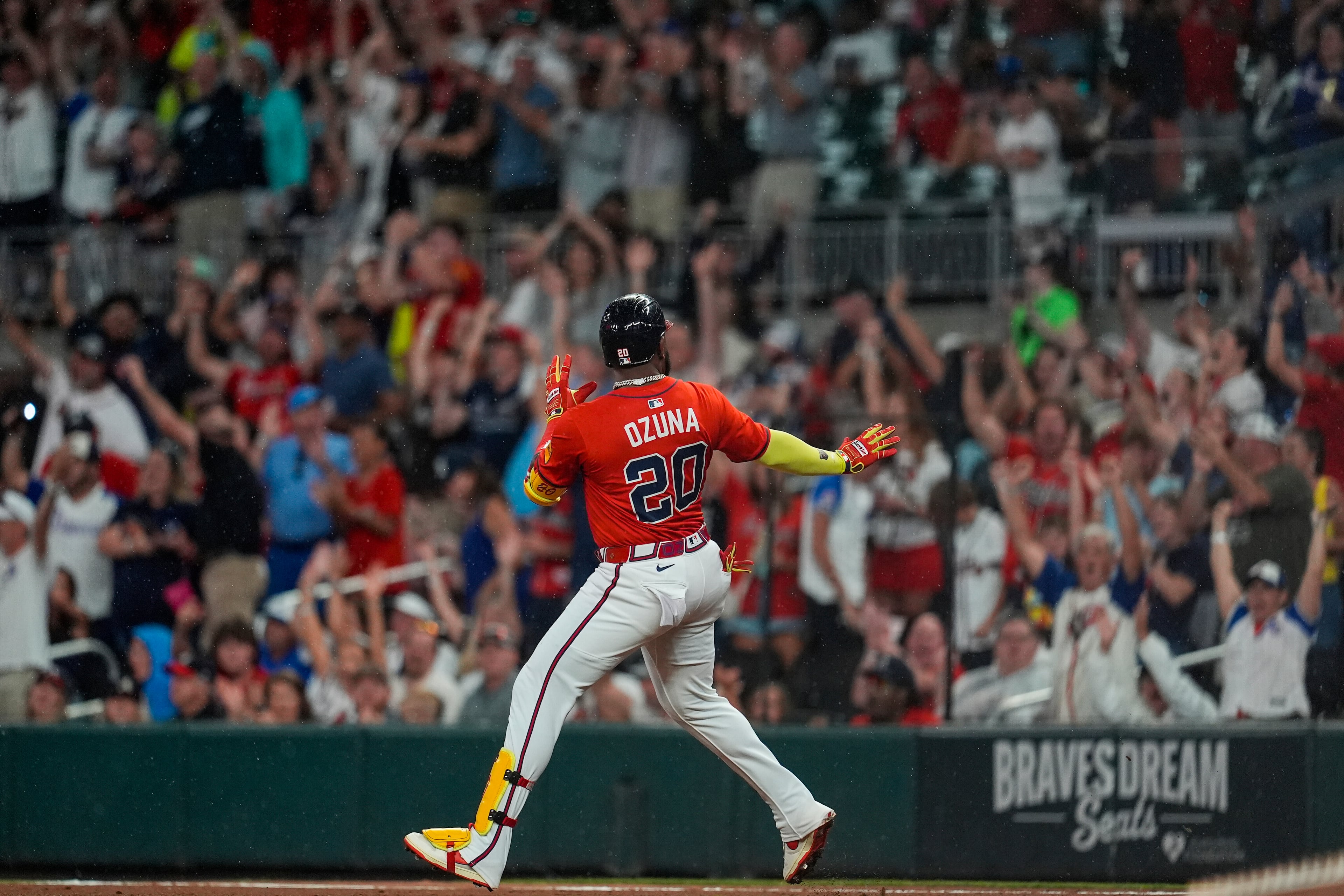 Braves designated hitter Marcell Ozuna celebrates his three-run homer against the Colorado Rockies during the seventh inning Friday in Atlanta. (Mike Stewart/AP)