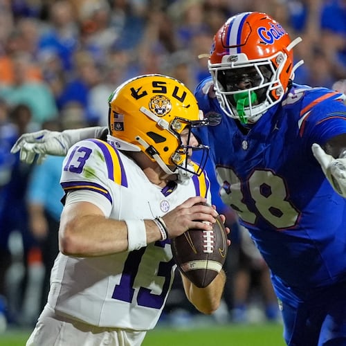 FILE - Florida defensive lineman Caleb Banks (88) sacks LSU quarterback Garrett Nussmeier (13) during the second half of an NCAA college football game, Saturday, Nov. 16, 2024, in Gainesville, Fla. (AP Photo/John Raoux, File)