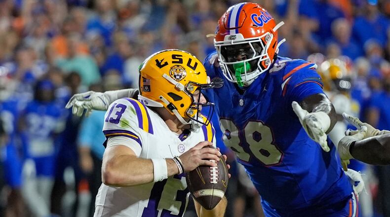 FILE - Florida defensive lineman Caleb Banks (88) sacks LSU quarterback Garrett Nussmeier (13) during the second half of an NCAA college football game, Saturday, Nov. 16, 2024, in Gainesville, Fla. (AP Photo/John Raoux, File)