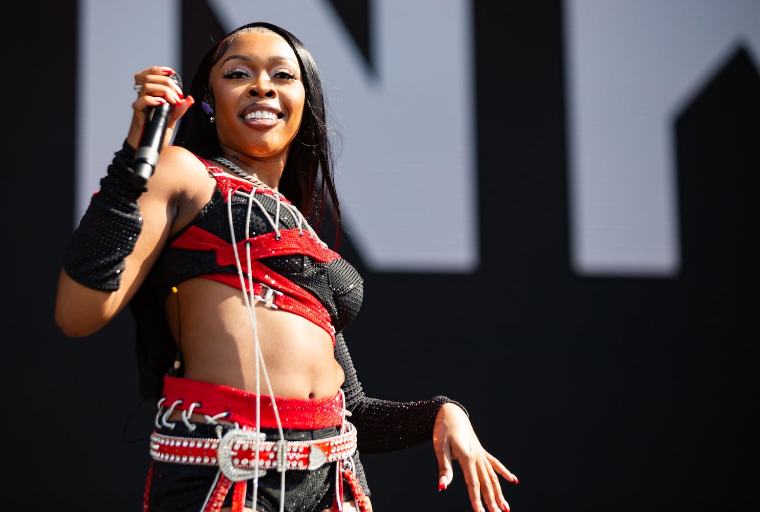 Tink took the ONE Musicfest sage early to kick the festival off right in Atlanta on Saturday, Oct. 28, 2023. (Ryan Fleisher for The Atlanta Journal-Constitution)