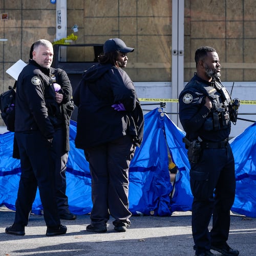 The deadly shooting happened at the West Ridge Shopping Center on Martin Luther King Jr. Drive near Lynhurst Drive, police said. (Ben Hendren for the AJC)