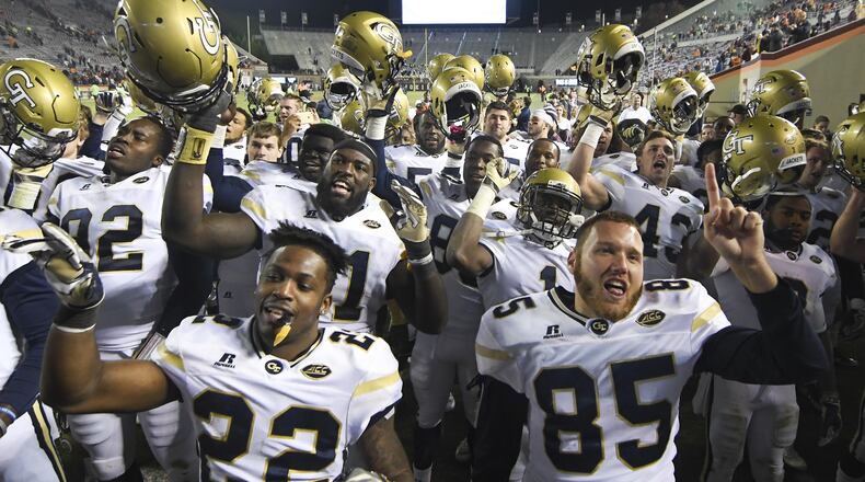 BLACKSBURG, VA - NOVEMBER 12: Members of the Georgia Tech Yellow Jackets sing the fight song following the victory against the Virginia Tech Hokies at Lane Stadium on November 12, 2016 in Blacksburg, Virginia. Georgia Tech defeated Virginia Tech 30-20. (Photo by Michael Shroyer/Getty Images)