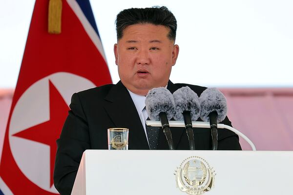 In this photo provided by the North Korean government, its leader Kim Jong Un speaks during a launch ceremony of a destroyer named Kang Kon at the Rajin shipyard in Rason, North Korea, Thursday, June 12, 2025. Independent journalists were not given access to cover the event depicted in this image distributed by the North Korean government. The content of this image is as provided and cannot be independently verified. Korean language watermark on image as provided by source reads: "KCNA" which is the abbreviation for Korean Central News Agency. (Korean Central News Agency/Korea News Service via AP)