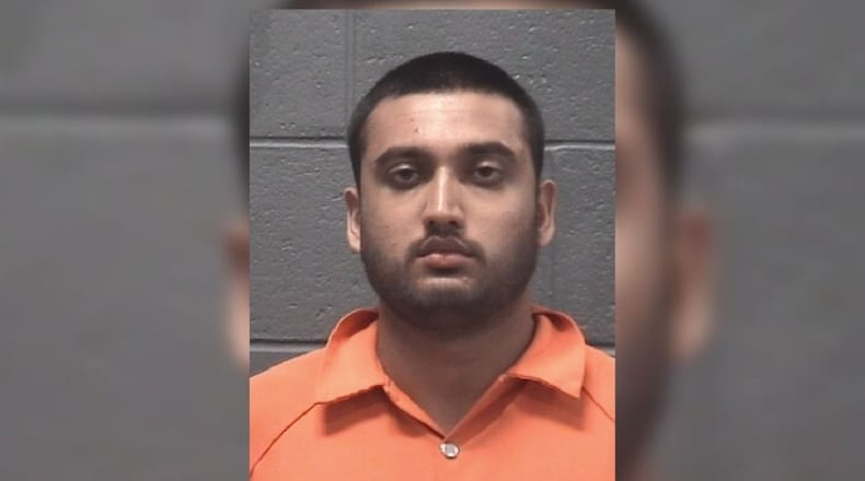 Rajeev Kumaraswamy, 25, was charged with murder in connection with the shooting of his father, police said.