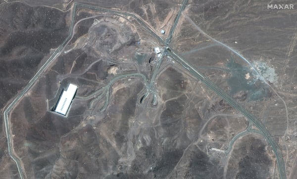 This satellite image provided by Maxar Technologies shows vehicles at Fordo enrichment facility in Iran on Thursday, June 19, 2025. (Maxar Technologies via AP)