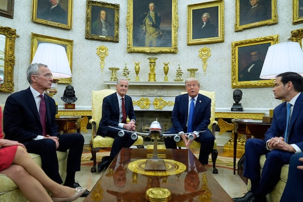 President Donald Trump and Norwegian Prime Minister Jonas Gahr Støre during a bilateral meeting in the Oval Office of the White House, Thursday, April 24, 2025, in Washington. (AP Photo/Mark Schiefelbein)