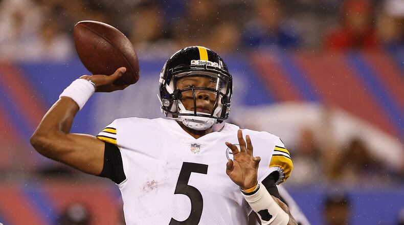 EAST RUTHERFORD, NJ - AUGUST 11: Quarterback Joshua Dobbs #5 of the Pittsburgh Steelers attempts a pass against the New York Giants during the second quarter of an NFL preseason game at MetLife Stadium on August 11, 2017 in East Rutherford, New Jersey. (Photo by Rich Schultz/Getty Images)