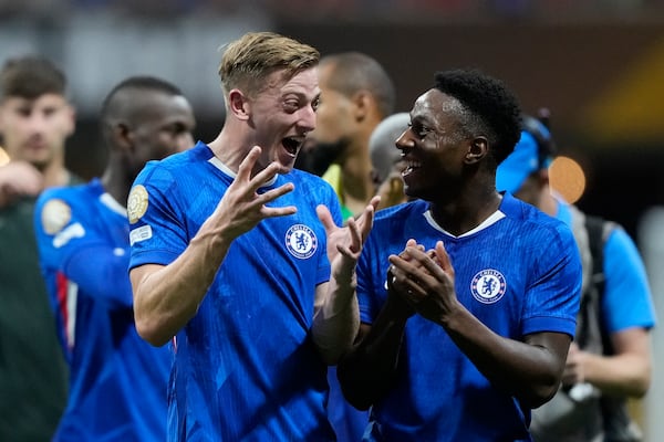 Chelsea's Liam Delap, left, celebrates at the end of the Club World Cup group D soccer match between Chelsea and Los Angeles FC in Atlanta, Monday, June 16, 2025. (AP Photo/Brynn Anderson)