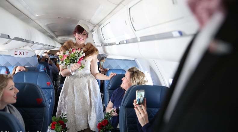 Ken Nilsen proposed to his girlfriend, Tracy Bellman, on a trip to Paris. They got married on a recent Delta flight. Contributed by Delta. Photos taken by Sherri Barber
