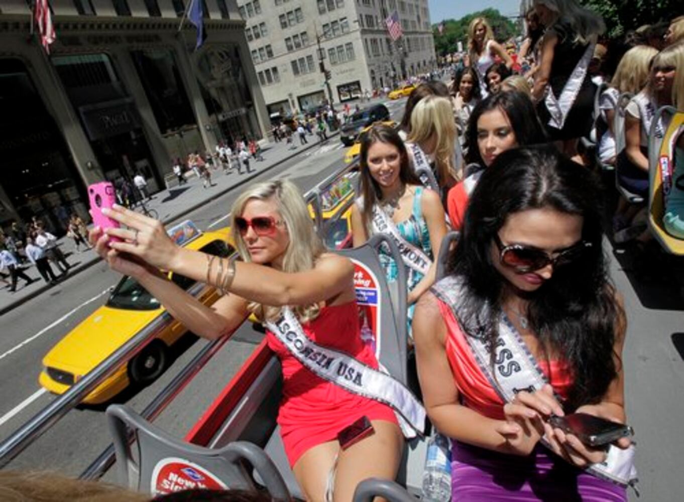 Donald Trump greets Miss USA 2011 contestants