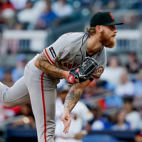 San Francisco Giants pitcher Carson Whisenhunt delivers to an Atlanta Braves batter during the first inning of a baseball game, Wednesday, June 17, 2026, in Atlanta. (AP Photo/Erik S. Lesser)